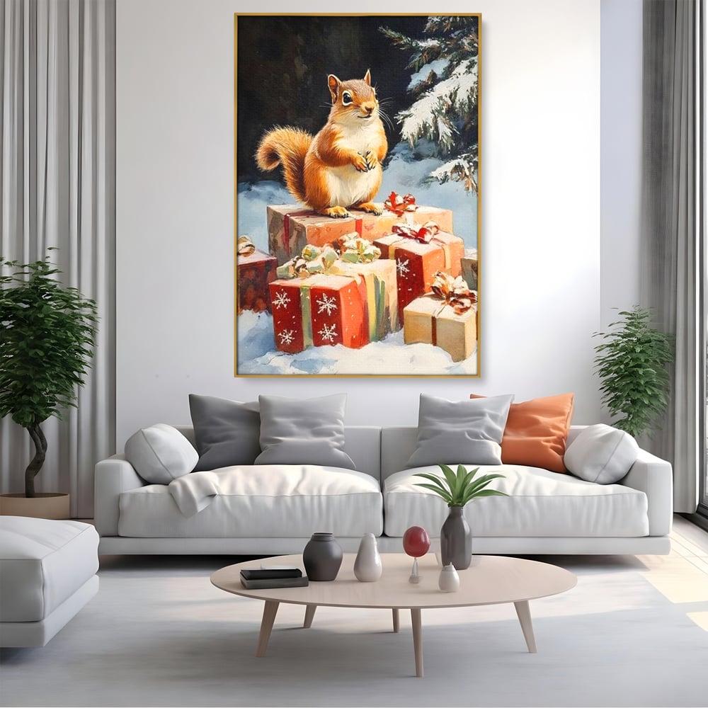 Tablou canvas cu tablou canvas cu veverita si cadouri de iarna, in rama de aluminiu auriu, pe perete intr-un living