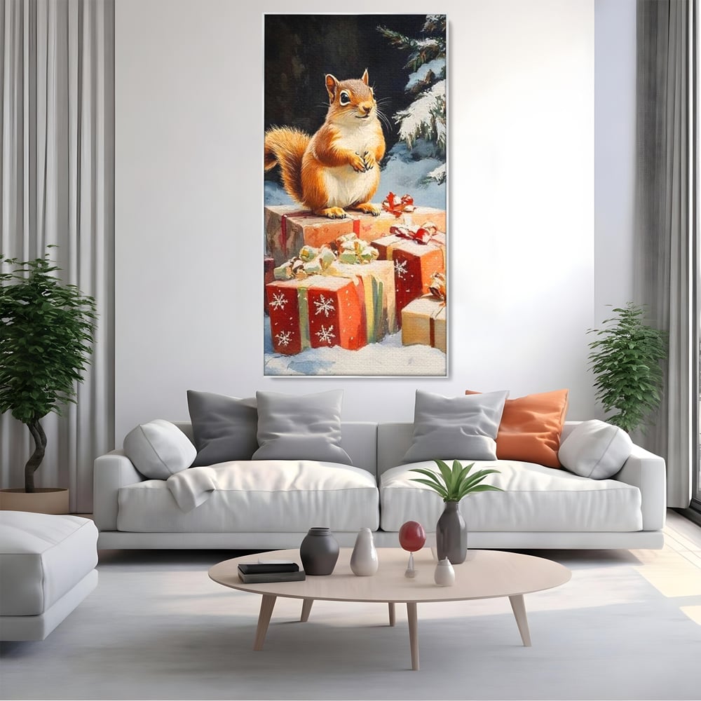 Tablou canvas cu tablou canvas cu veverita si cadouri de iarna, in rama de aluminiu argintiu, pe perete intr-un living