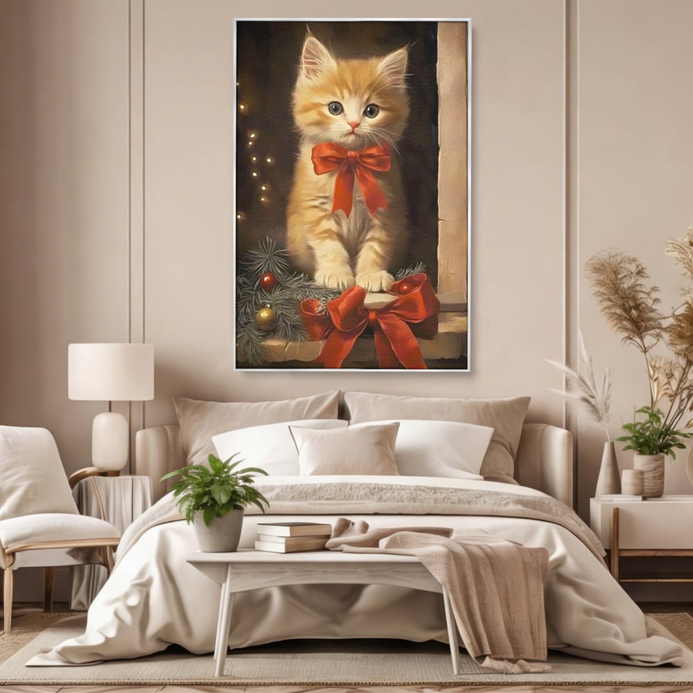 Tablou canvas cu tablou canvas cu pisoi si funda rosie, in rama de aluminiu argintiu, pe perete intr-un dormitor