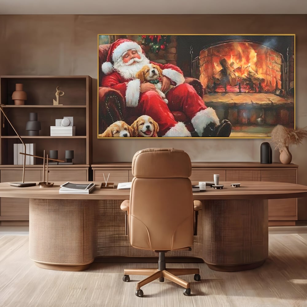 Tablou canvas cu mos craciun dormind cu catei langa semineu, in rama de aluminiu auriu, pe perete intr-un birou