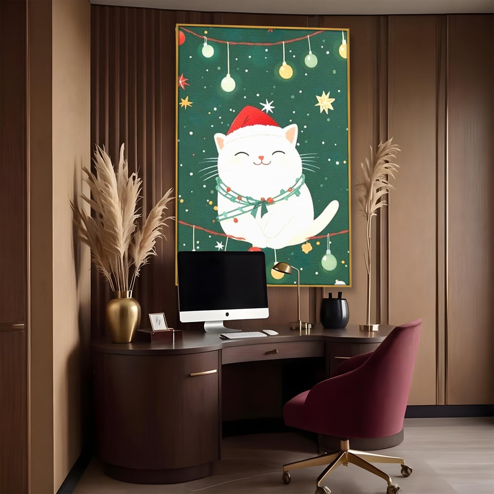 Tablou canvas cu ilustratie cu pisica alba de craciun, in rama de aluminiu auriu, pe perete intr-un birou