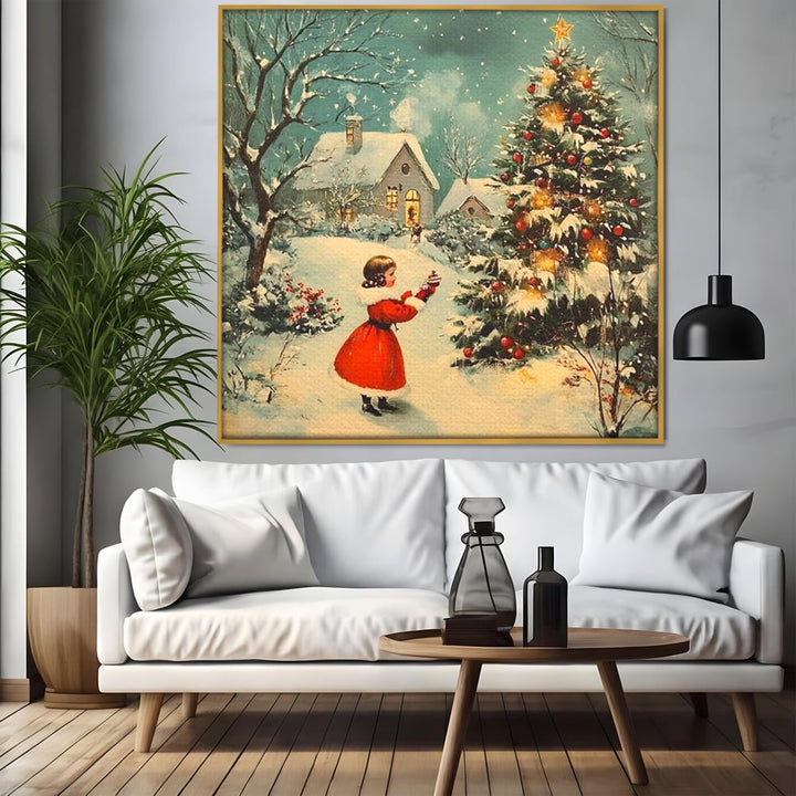 Tablou canvas cu pictura cu fetita si brad de craciun, in rama de aluminiu auriu, pe perete intr-un living