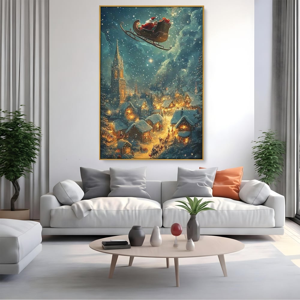 Tablou canvas cu tablou canvas cu mos craciun in sanie, in rama de aluminiu auriu, pe perete intr-un living