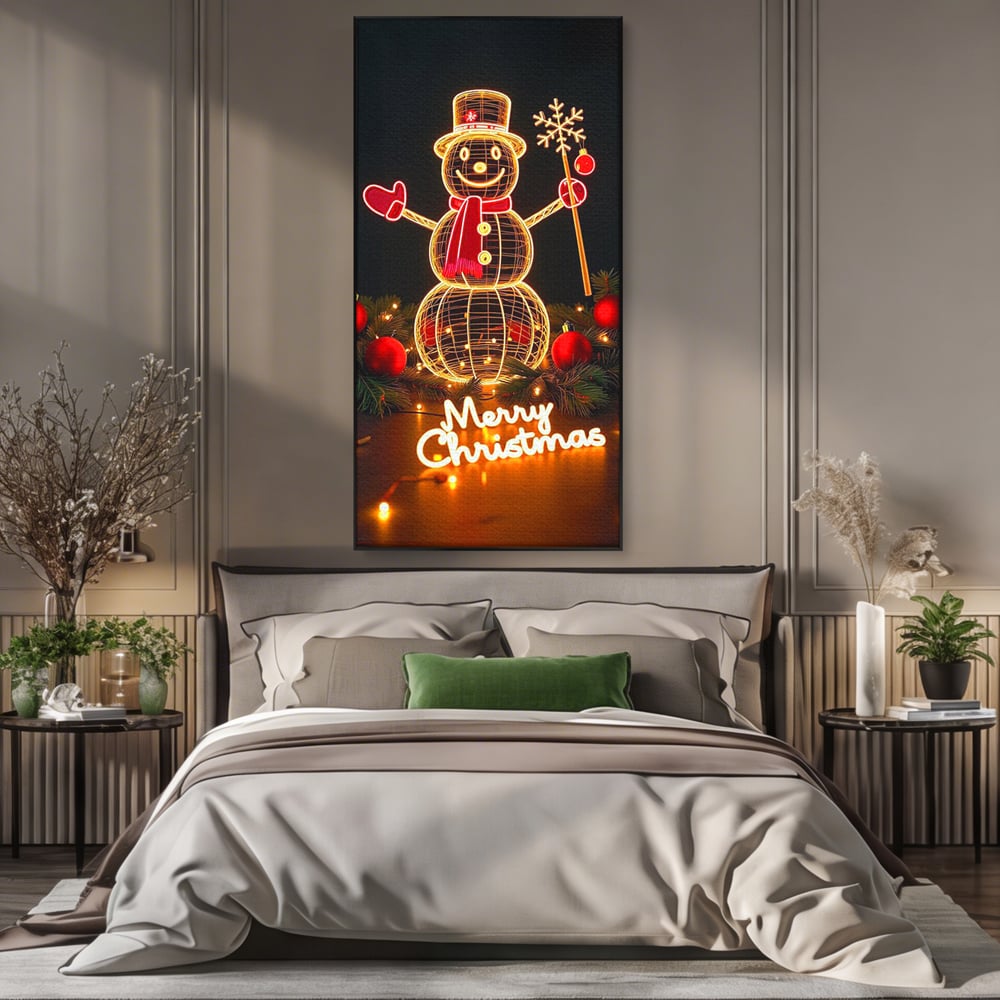 Tablou canvas cu ilustratie cu om de zapada luminos, in rama de aluminiu negru, pe perete intr-un dormitor