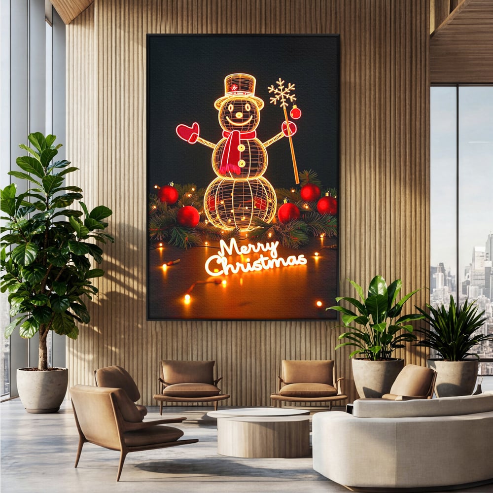 Tablou canvas cu ilustratie cu om de zapada luminos, in rama de aluminiu negru, pe perete intr-un birou