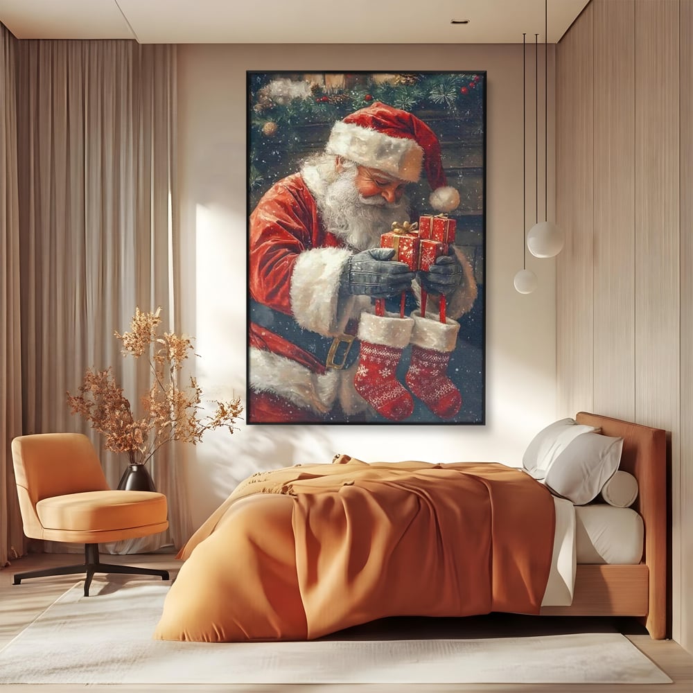Tablou canvas cu ilustratie cu mos craciun tinand cadouri, in rama de aluminiu negru, pe perete intr-un dormitor