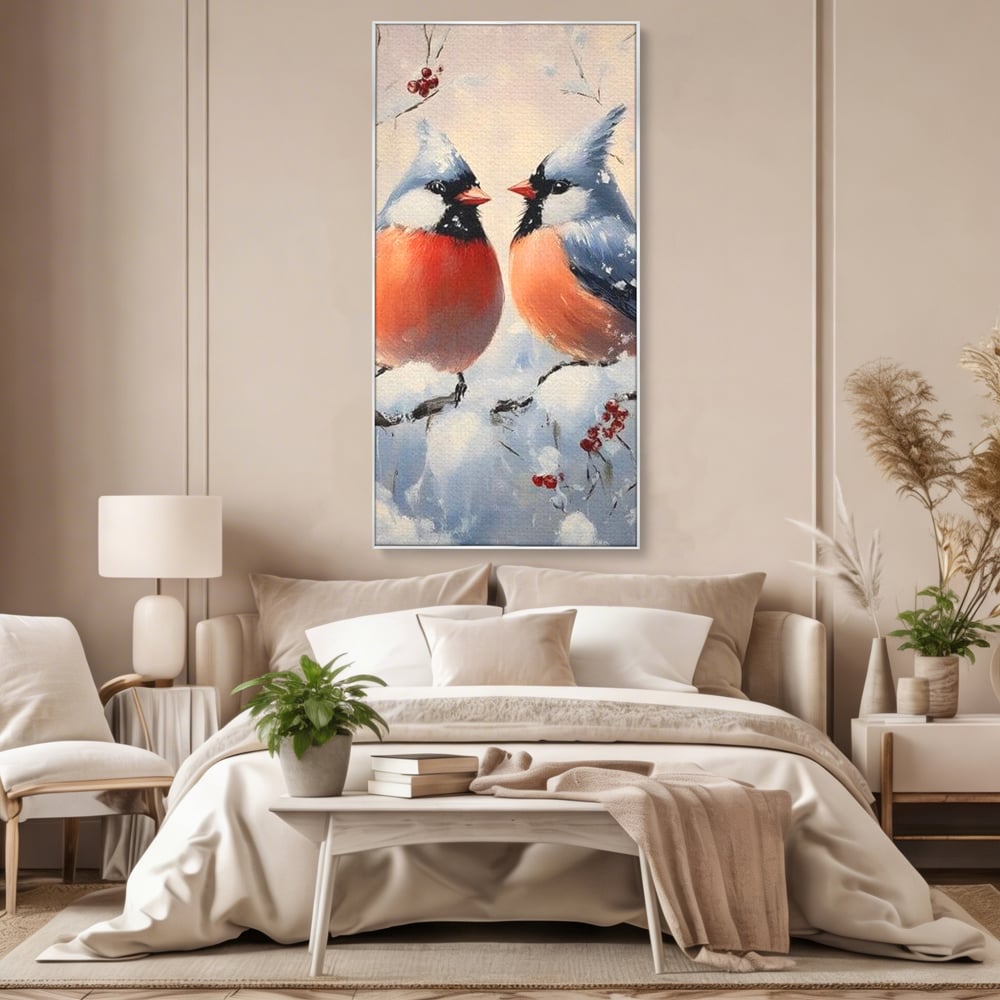 Tablou canvas cu tablou canvas cu doi pasari cardinali in iarna, in rama de aluminiu argintiu, pe perete intr-un dormitor