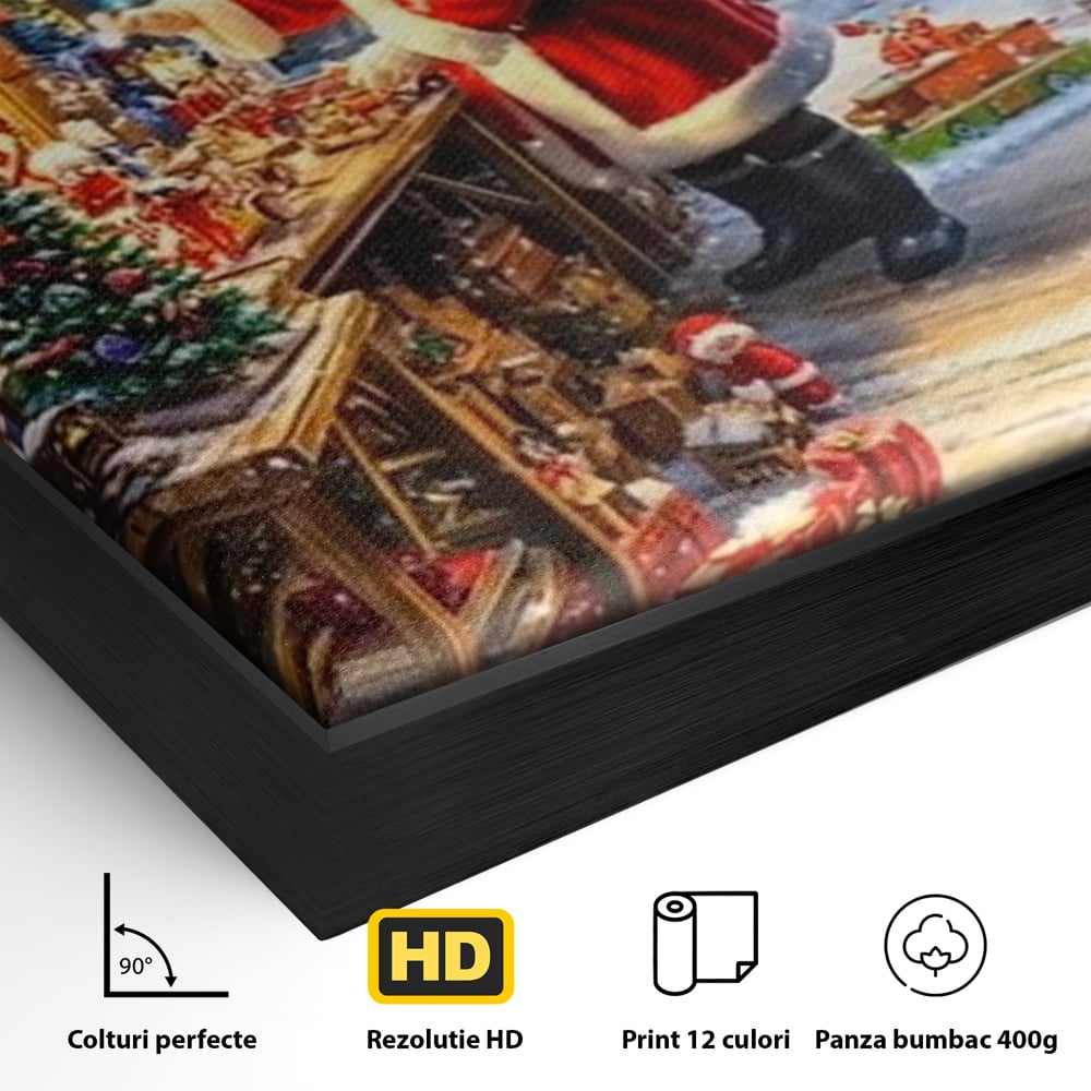 Detaliu al suprafetei: ilustratie digitala cu mos craciun in atelier, in rama de aluminiu negru