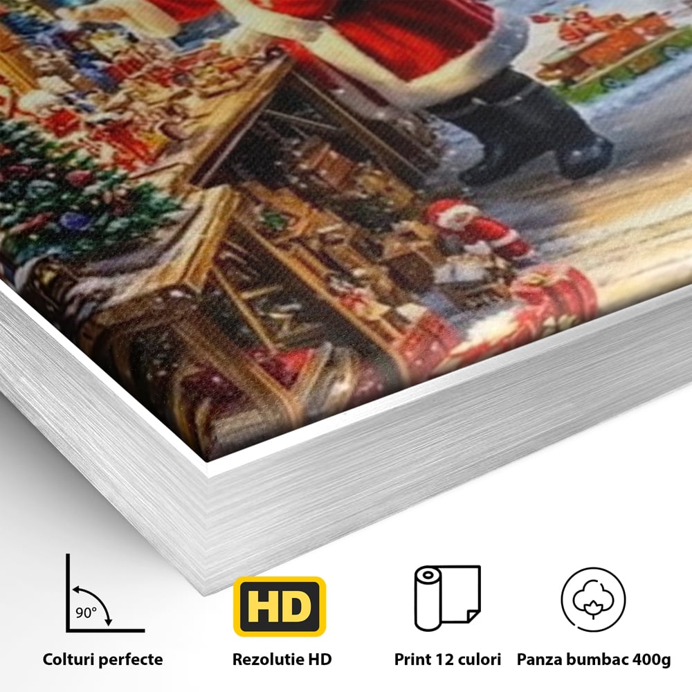 Detaliu al suprafetei: ilustratie digitala cu mos craciun in atelier, in rama de aluminiu argintiu