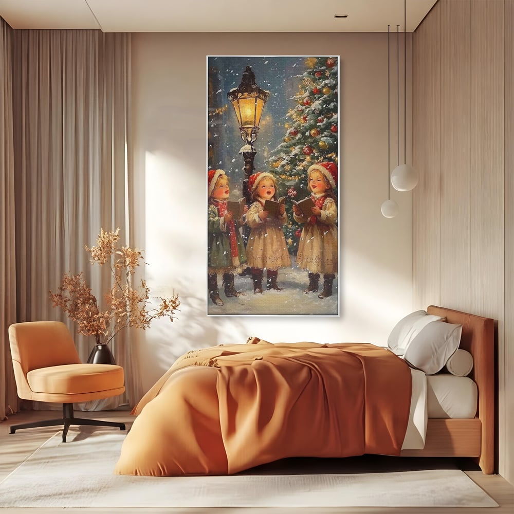 Tablou canvas cu pictura cu trei fetite colindatoare, in rama de aluminiu argintiu, pe perete intr-un dormitor