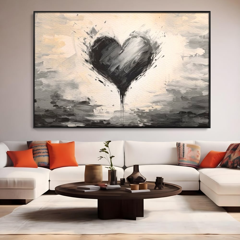 Tablou canvas cu tablou abstract cu inima neagra, in rama de aluminiu negru, pe perete intr-un living