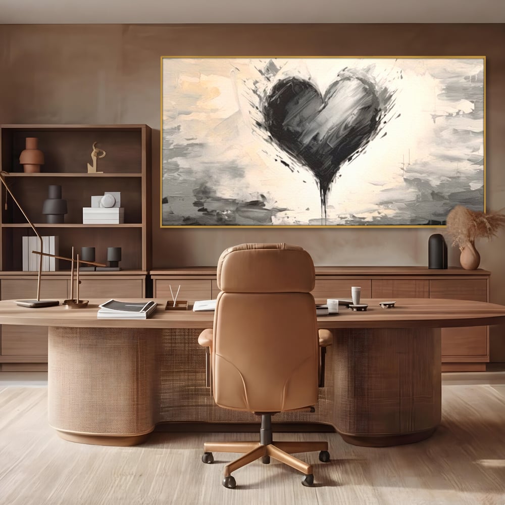 Tablou canvas cu tablou abstract cu inima neagra, in rama de aluminiu auriu, pe perete intr-un birou