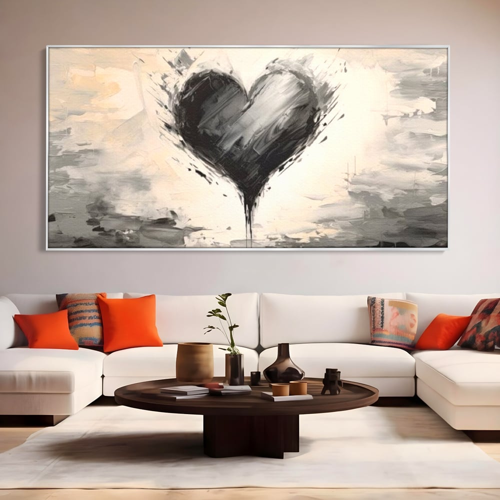 Tablou canvas cu tablou abstract cu inima neagra, in rama de aluminiu argintiu, pe perete intr-un living