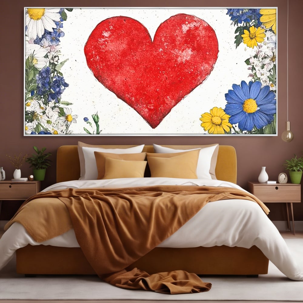 Tablou canvas cu tablou canvas cu inima rosie si flori, in rama de aluminiu argintiu, pe perete intr-un dormitor