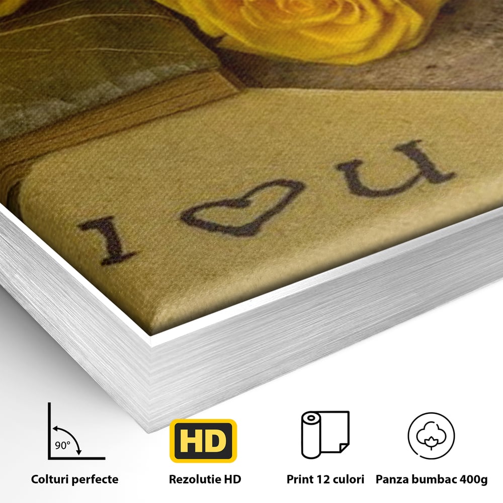 Detaliu al suprafetei: tablou canvas cu trandafiri galbeni si jurnal, in rama de aluminiu argintiu