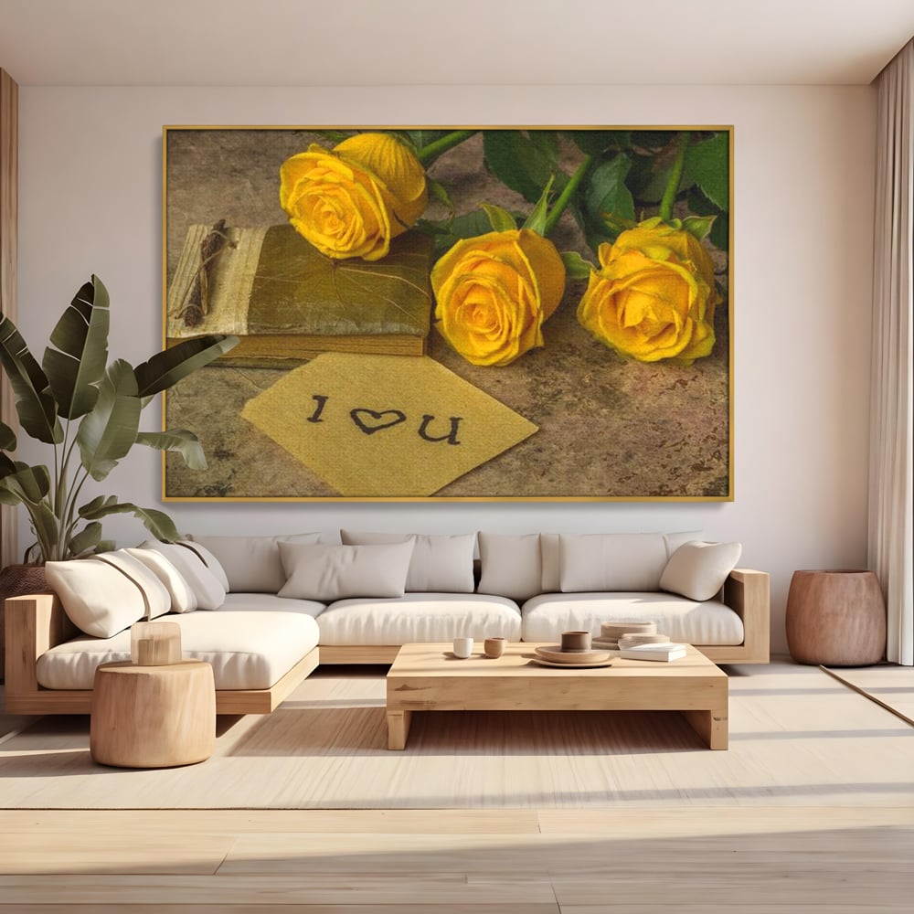 Tablou canvas cu tablou canvas cu trandafiri galbeni si jurnal, in rama de aluminiu auriu, pe perete intr-un living