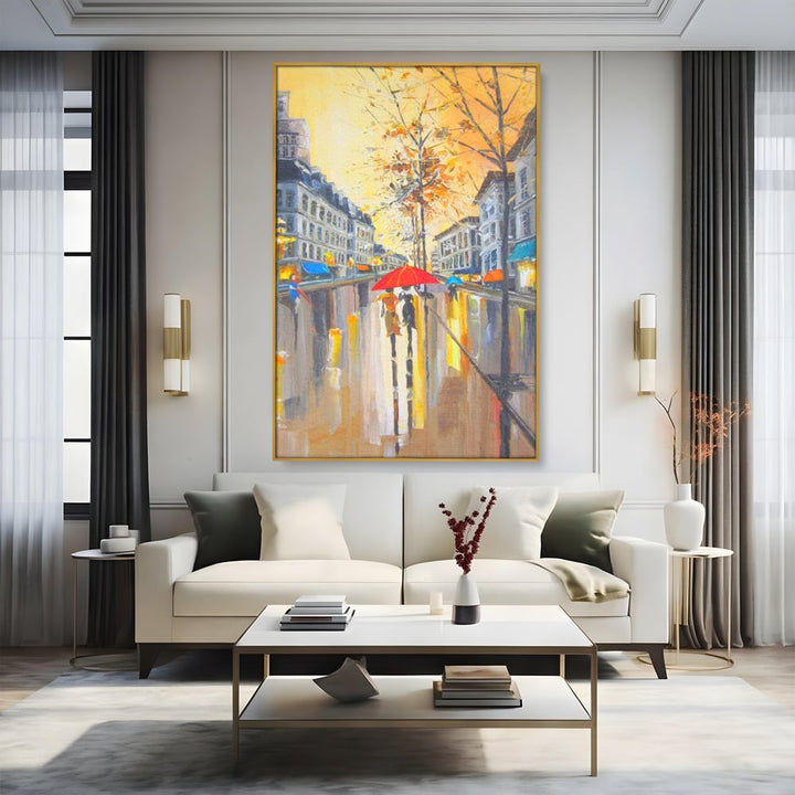 Tablou canvas cu tablou canvas cu peisaj urban ploios, in rama de aluminiu auriu, pe perete intr-un living