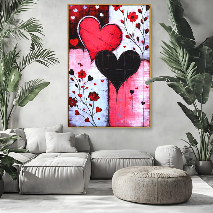 Tablou canvas cu tablou canvas cu inimi si flori, in rama de aluminiu auriu, pe perete intr-un living
