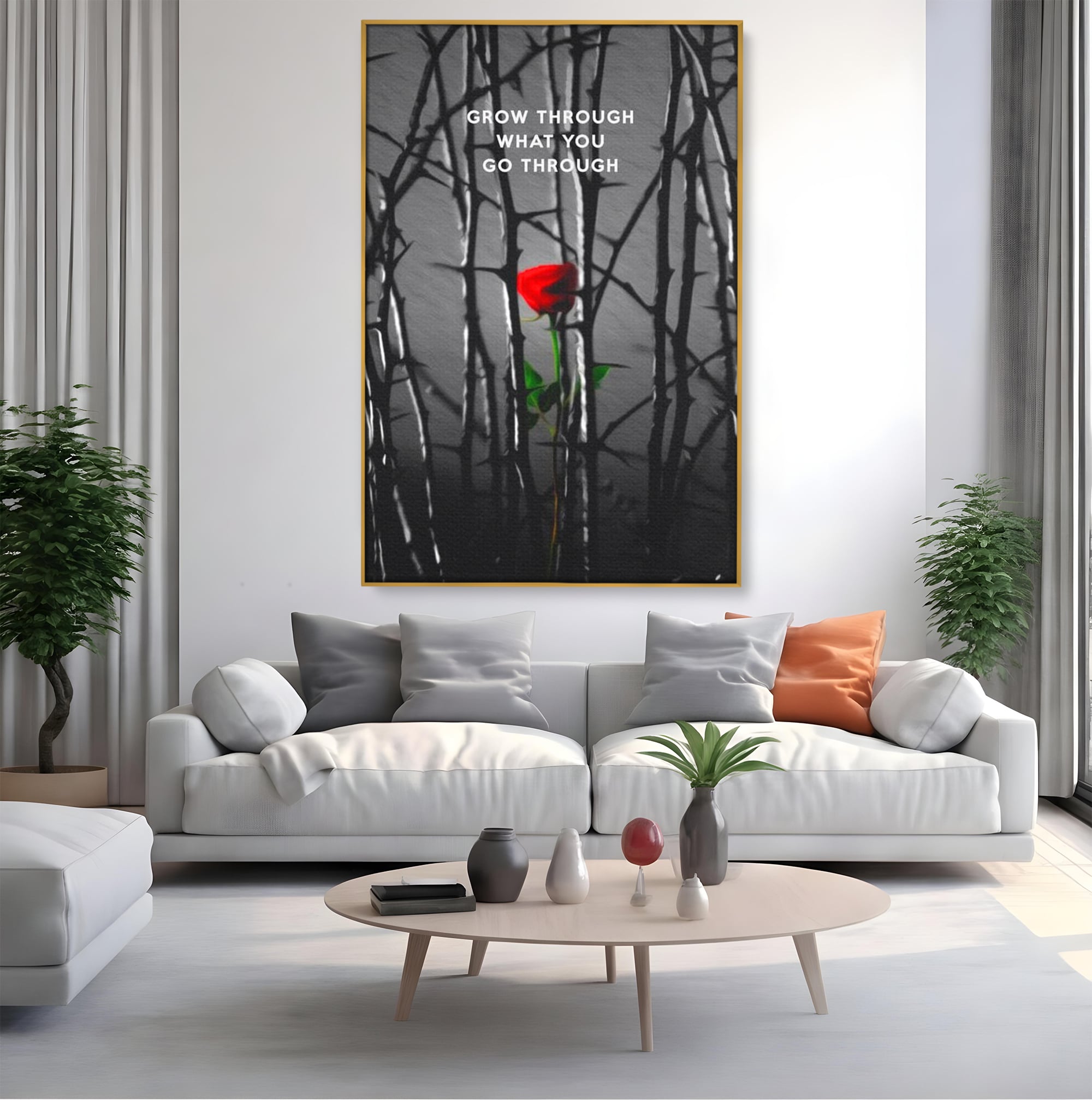 Tablou canvas cu tablou motivational cu trandafir rosu si spini, in rama de aluminiu auriu, pe perete intr-un living