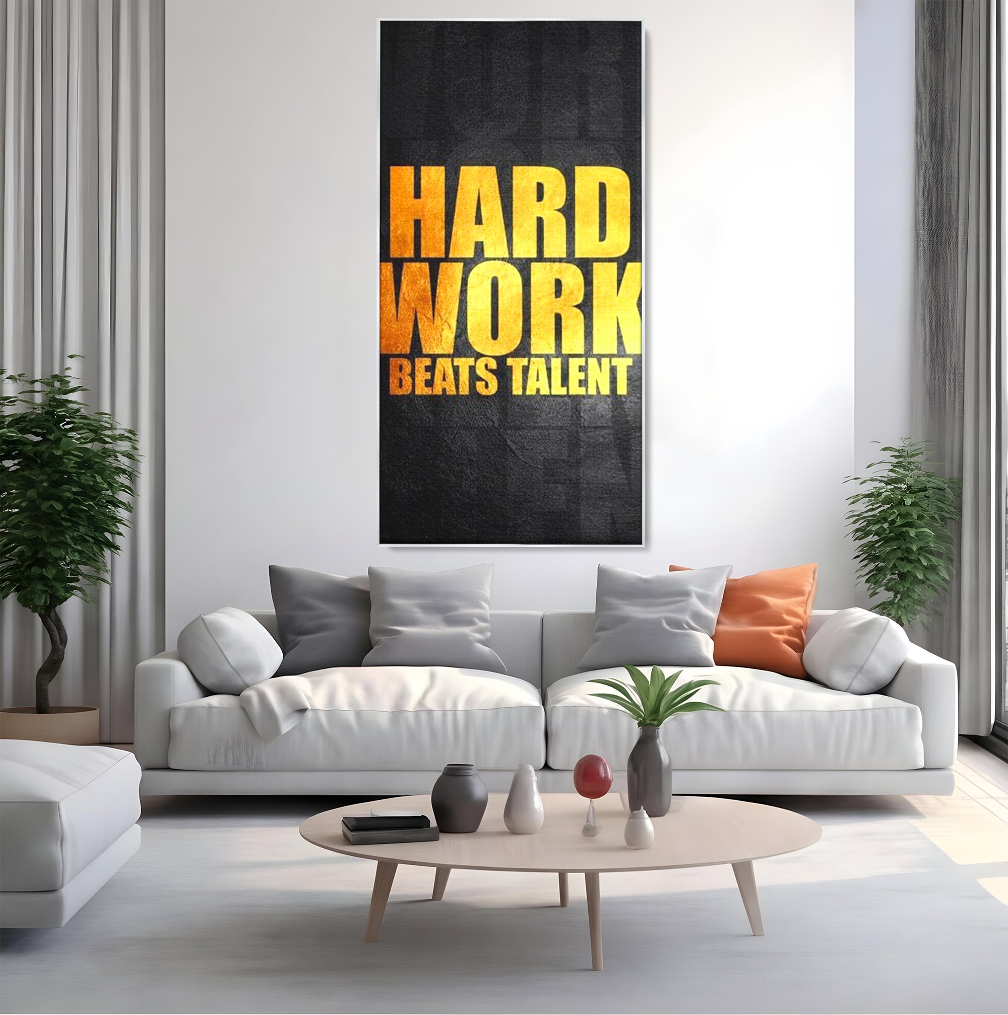 Tablou canvas cu tablou motivational cu mesaj aurit, in rama de aluminiu argintiu, pe perete intr-un living