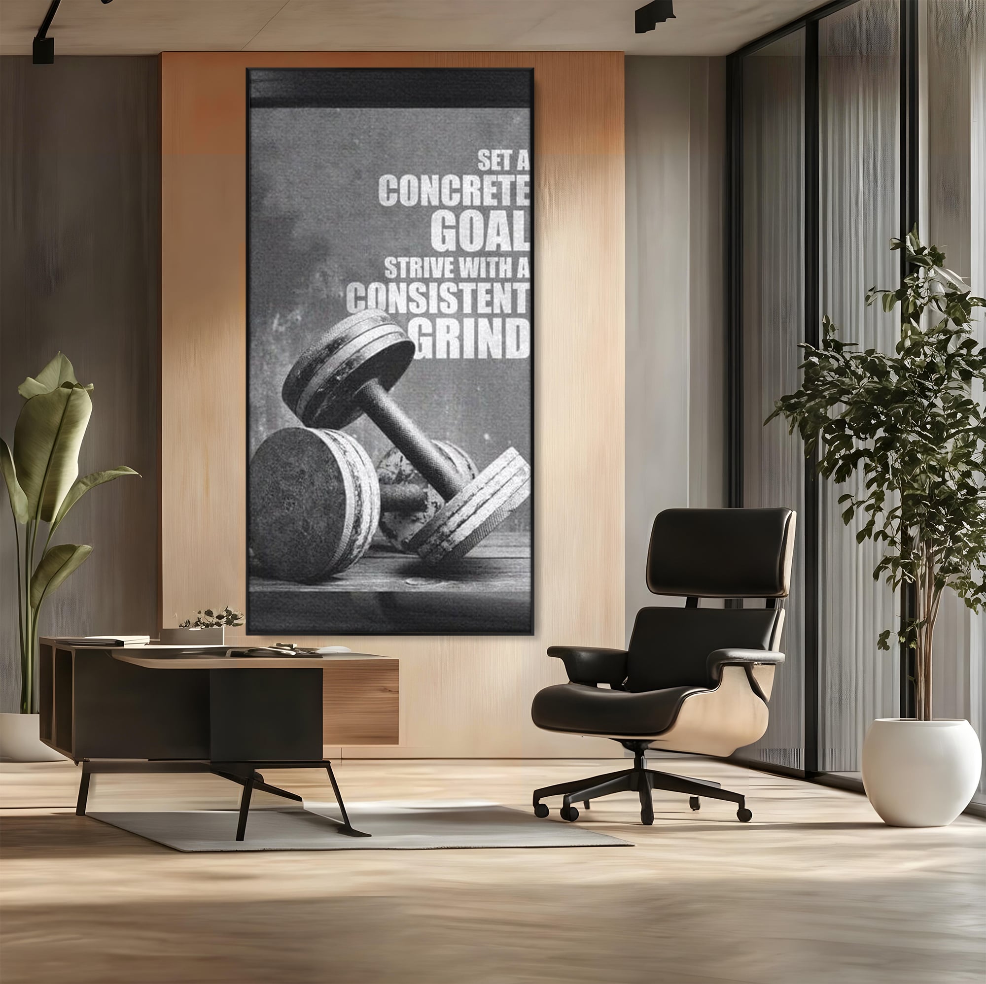 Tablou canvas cu tablou motivational cu gantere si text, in rama de aluminiu negru, pe perete intr-un birou
