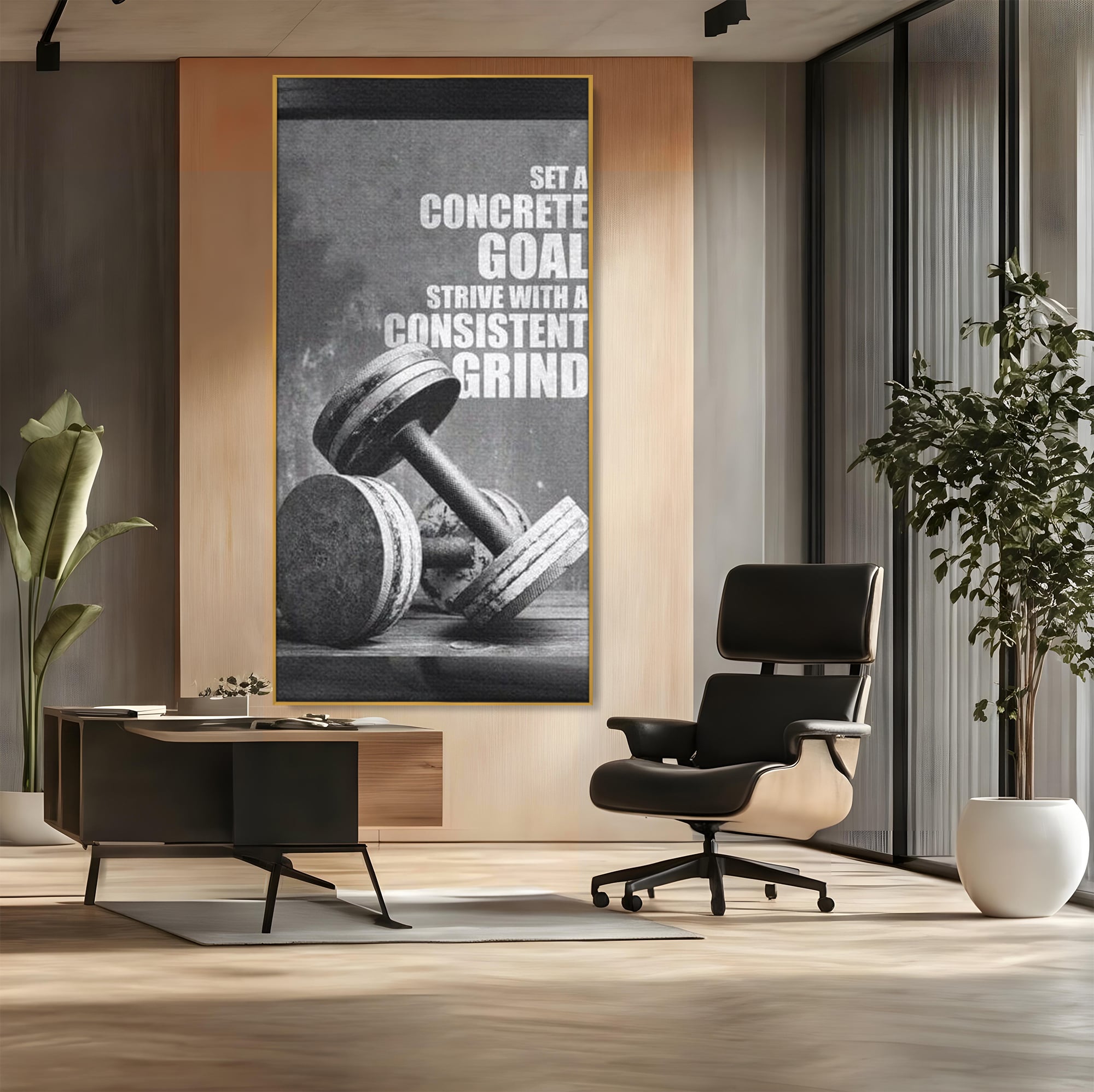 Tablou canvas cu tablou motivational cu gantere si text, in rama de aluminiu auriu, pe perete intr-un birou