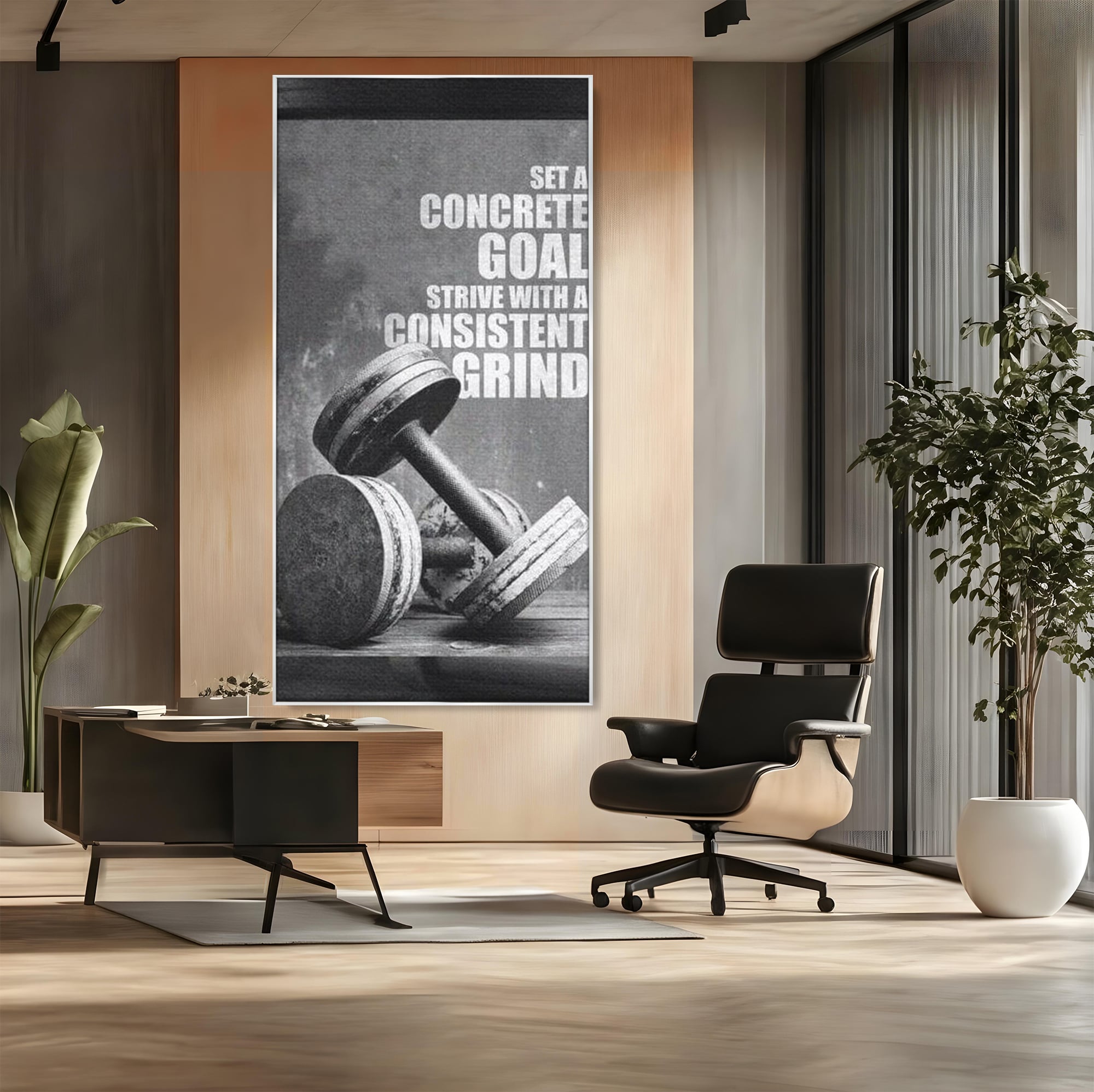Tablou canvas cu tablou motivational cu gantere si text, in rama de aluminiu argintiu, pe perete intr-un birou