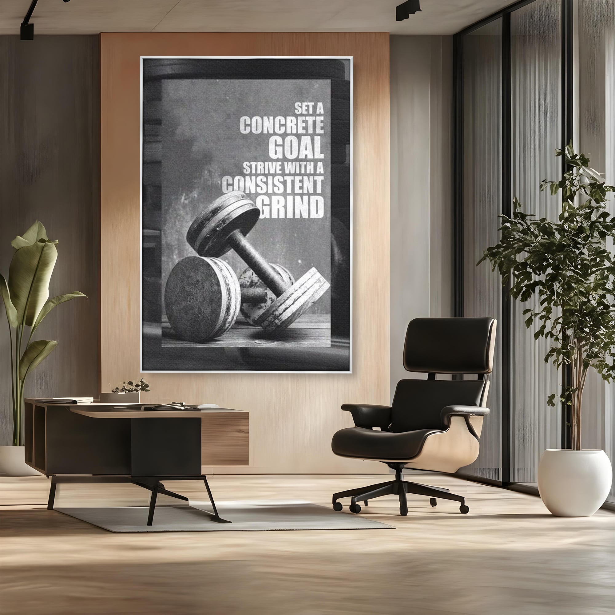 Tablou canvas cu tablou motivational cu gantere si text, in rama de aluminiu argintiu, pe perete intr-un birou