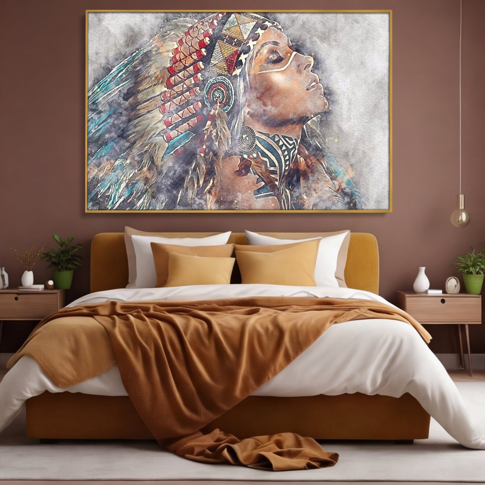 Tablou canvas cu tablou canvas cu femeie indigena, in rama de aluminiu auriu, pe perete intr-un dormitor
