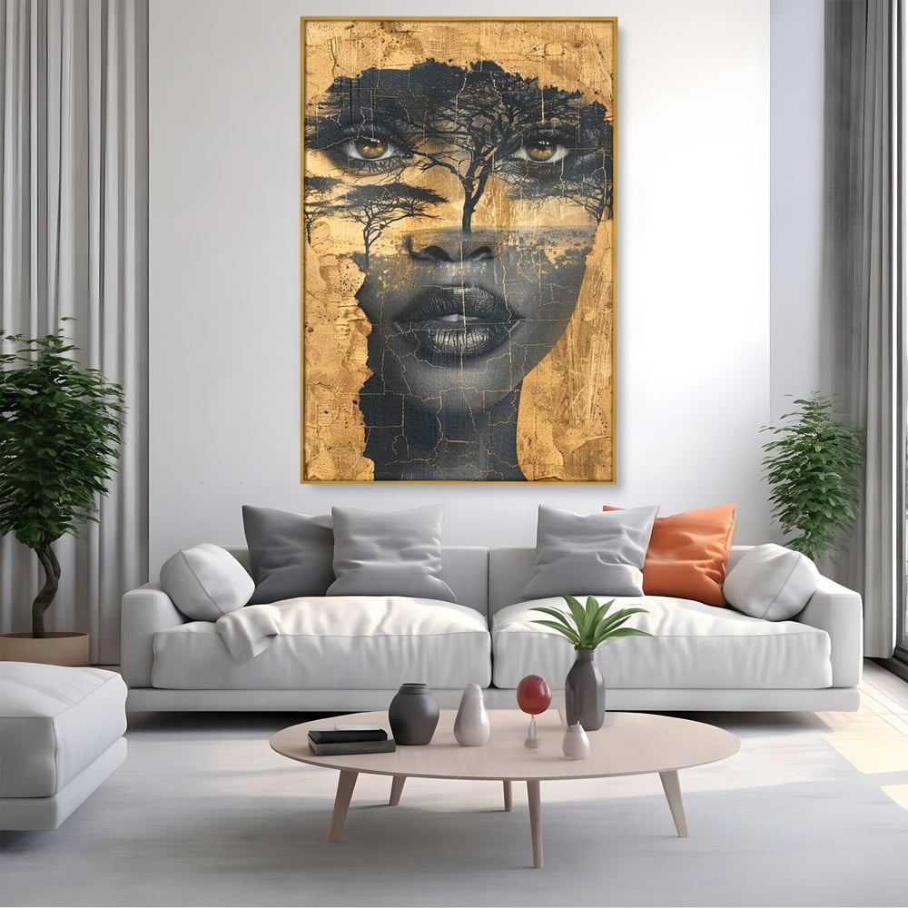 Tablou canvas cu tablou canvas cu chip de femeie si copaci, in rama de aluminiu auriu, pe perete intr-un living