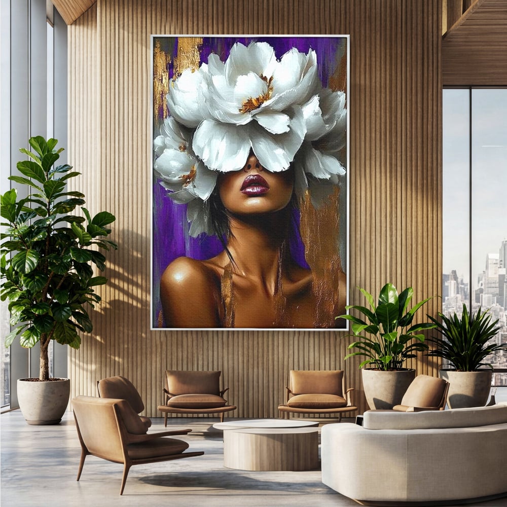 Tablou canvas cu tablou canvas cu femeie si flori albe, in rama de aluminiu argintiu, pe perete intr-un birou