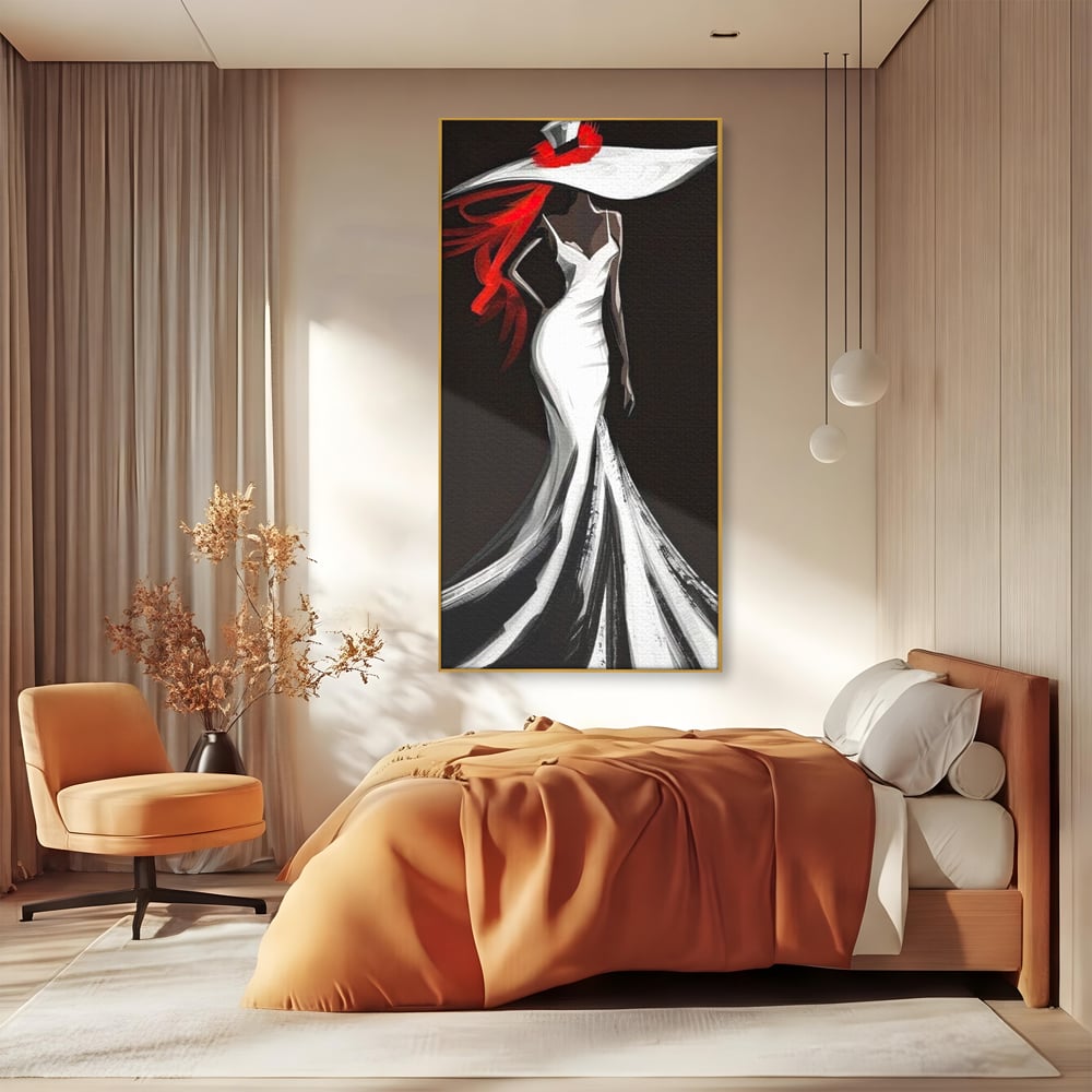 Tablou canvas cu tablou canvas cu silueta de femeie in rochie alba, in rama de aluminiu auriu, pe perete intr-un dormitor