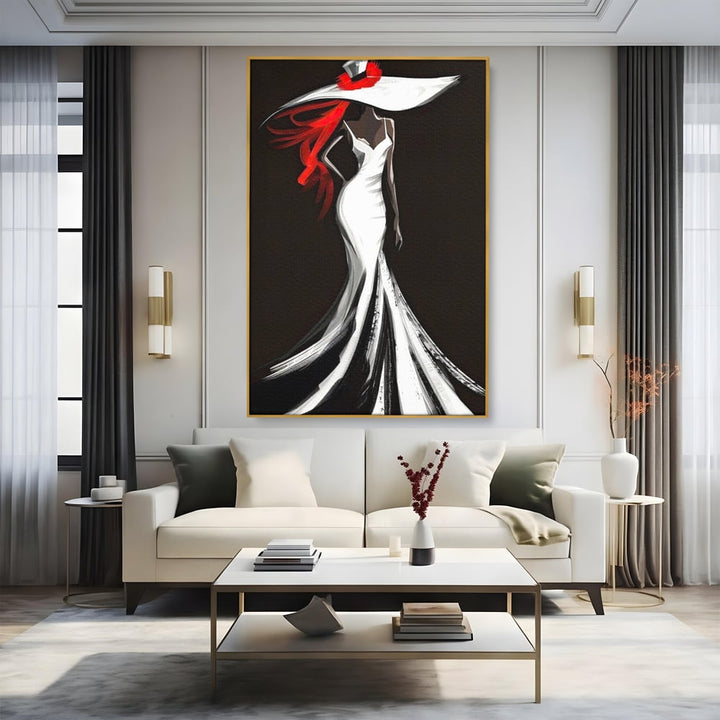 Tablou canvas cu tablou canvas cu silueta de femeie in rochie alba, in rama de aluminiu auriu, pe perete intr-un living