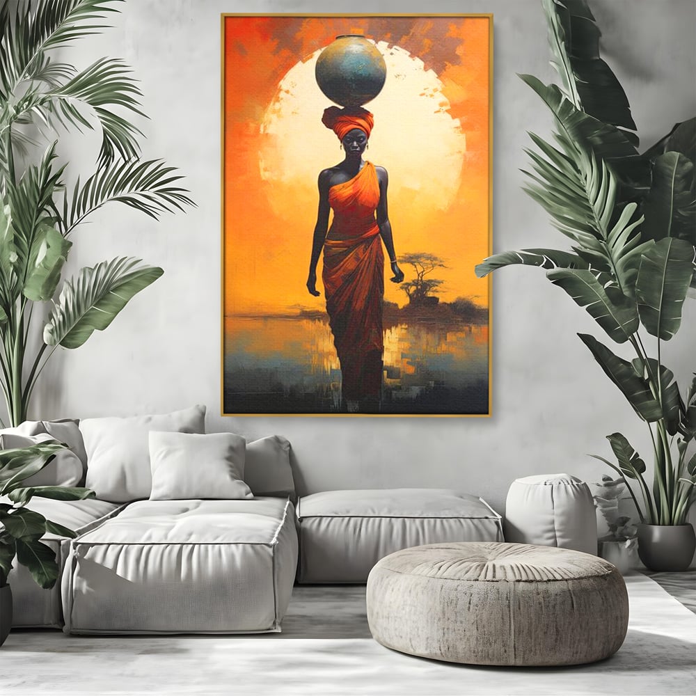 Tablou canvas cu tablou canvas cu femeie africana si ulcior, in rama de aluminiu auriu, pe perete intr-un living