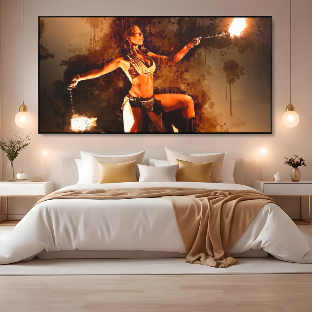 Tablou canvas cu tablou canvas cu dansatoare de foc, in rama de aluminiu negru, pe perete intr-un dormitor