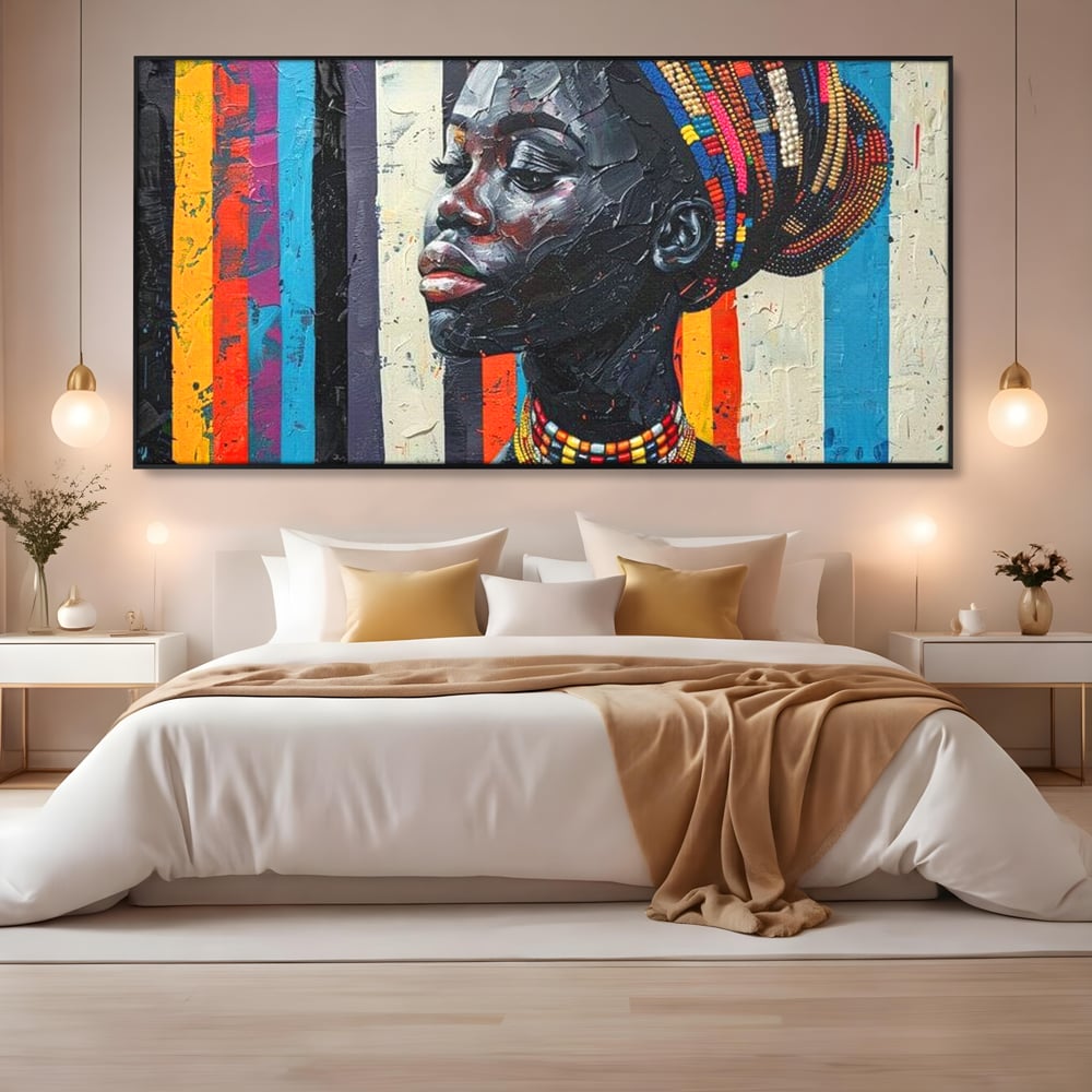 Tablou canvas cu tablou canvas cu profil de femeie, in rama de aluminiu negru, pe perete intr-un dormitor