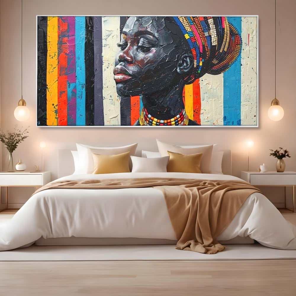 Tablou canvas cu tablou canvas cu profil de femeie, in rama de aluminiu argintiu, pe perete intr-un dormitor