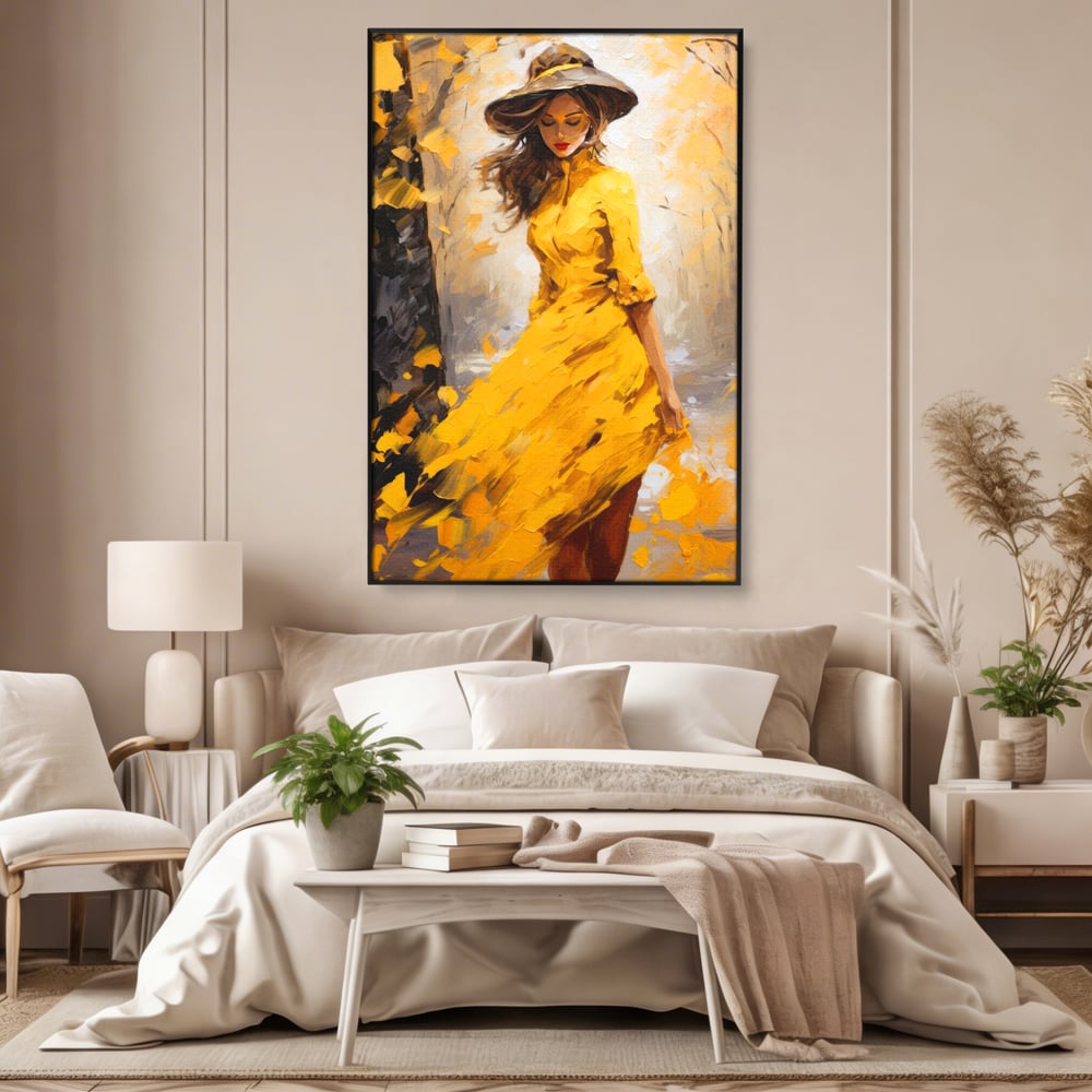 Tablou canvas cu tablou canvas cu femeie in galben, in rama de aluminiu negru, pe perete intr-un dormitor
