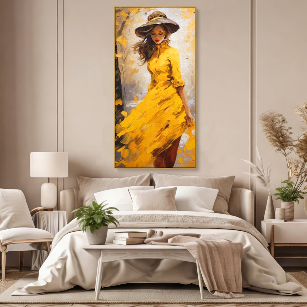 Tablou canvas cu tablou canvas cu femeie in galben, in rama de aluminiu auriu, pe perete intr-un dormitor