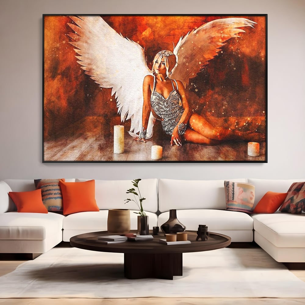 Tablou canvas cu tablou canvas cu inger si aripi, in rama de aluminiu negru, pe perete intr-un living