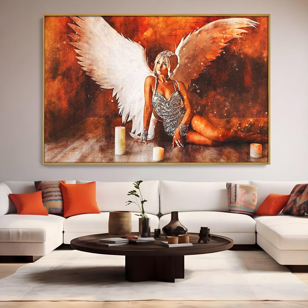 Tablou canvas cu tablou canvas cu inger si aripi, in rama de aluminiu auriu, pe perete intr-un living