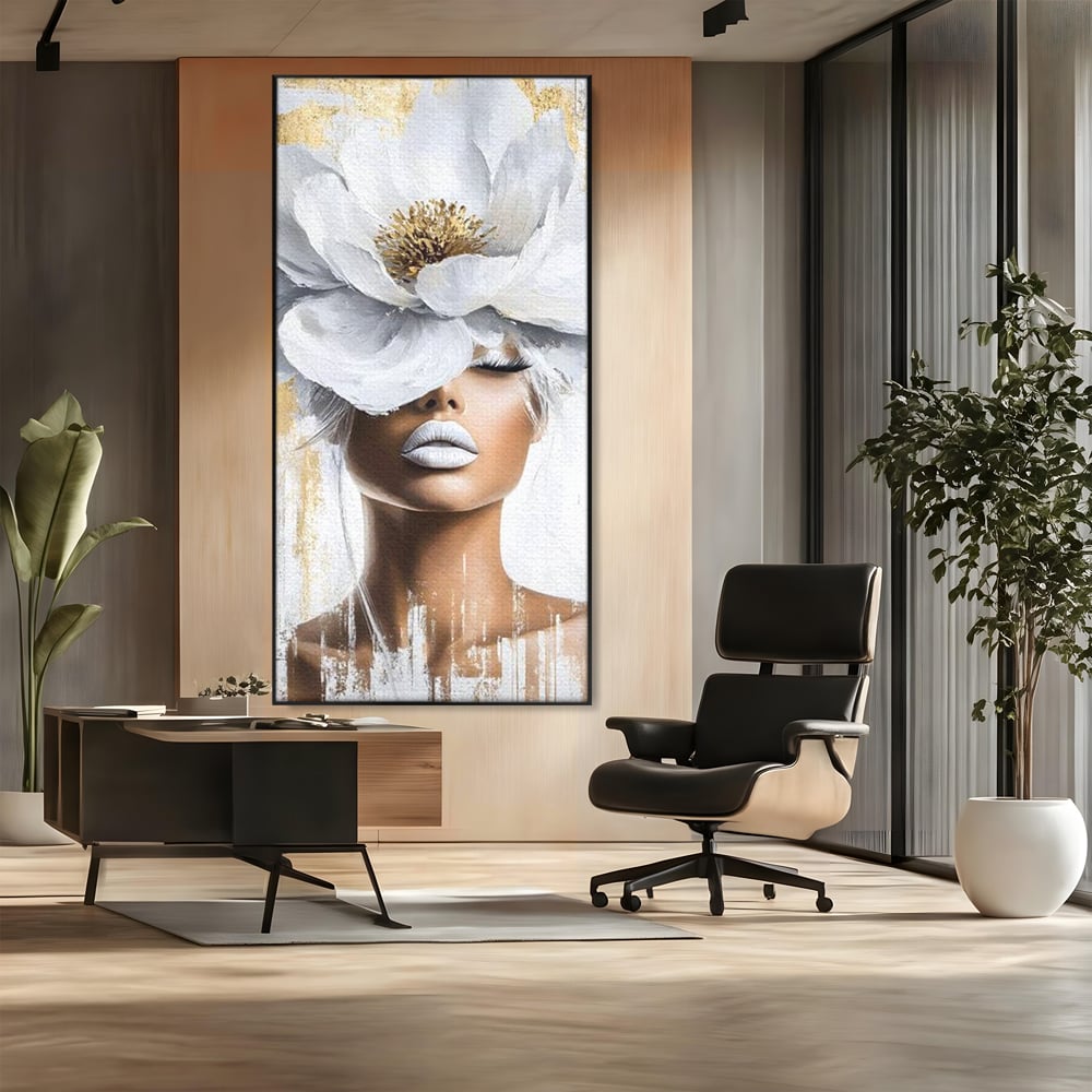 Tablou canvas cu tablou canvas cu portret de femeie si magnolie, in rama de aluminiu negru, pe perete intr-un birou