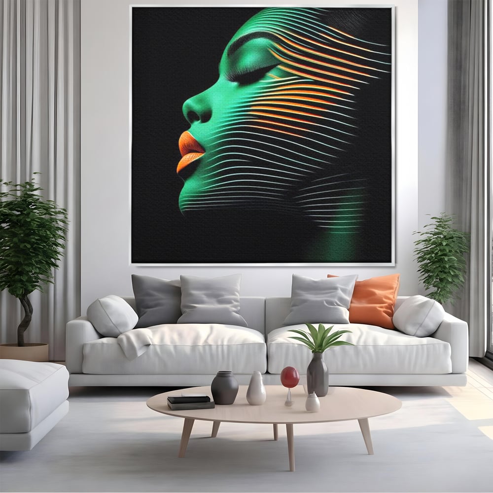 Tablou canvas cu tablou canvas portret de femeie in profil cu raze verzi, in rama de aluminiu argintiu, pe perete intr-un living