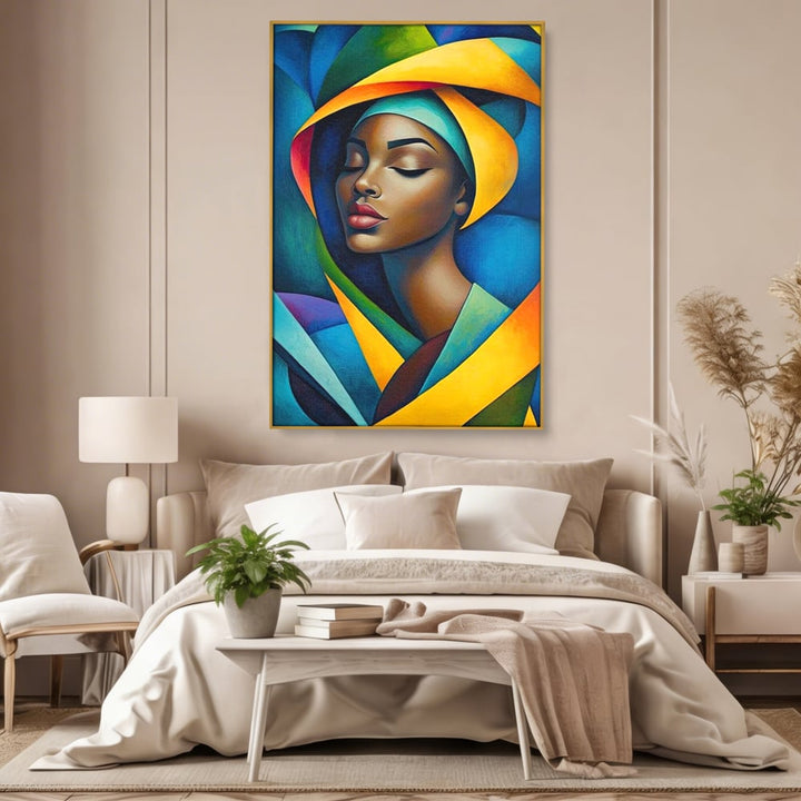 Tablou canvas cu tablou canvas cu portret feminin geometric, in rama de aluminiu auriu, pe perete intr-un dormitor