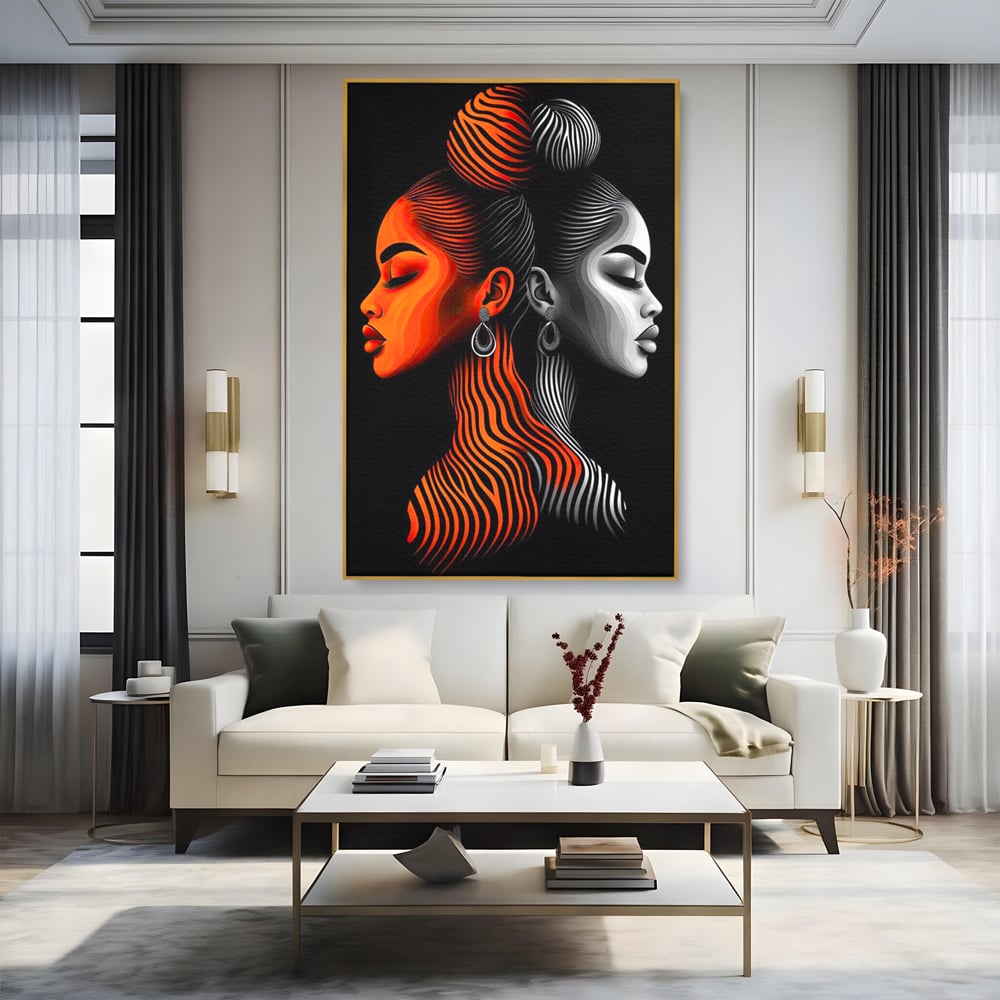 Tablou canvas cu tablou canvas cu doua fete stilizate, in rama de aluminiu auriu, pe perete intr-un living
