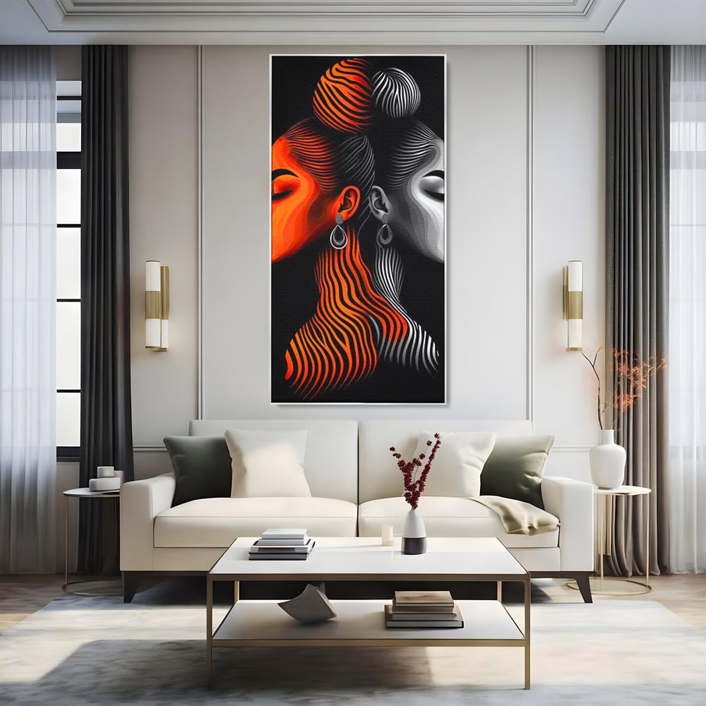 Tablou canvas cu tablou canvas cu doua fete stilizate, in rama de aluminiu argintiu, pe perete intr-un living