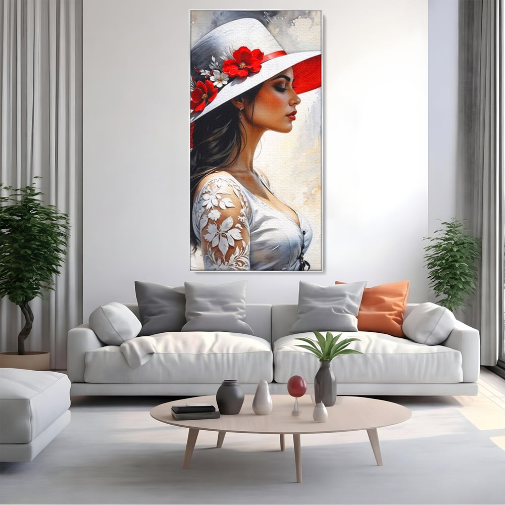 Tablou canvas cu tablou canvas cu profil de doamna, in rama de aluminiu argintiu, pe perete intr-un living