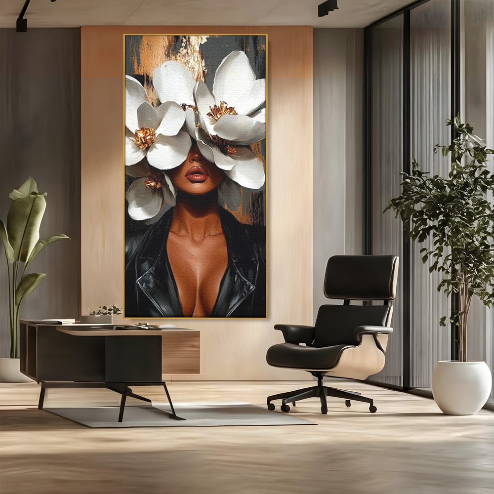 Tablou canvas cu tablou canvas cu femeie si magnolii, in rama de aluminiu auriu, pe perete intr-un birou