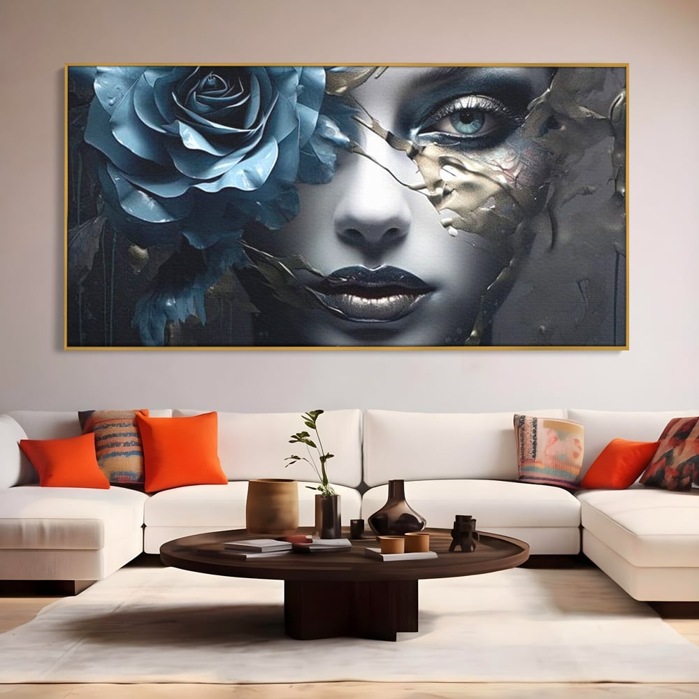 Tablou canvas cu tablou canvas cu chip de femeie si trandafir albastru, in rama de aluminiu auriu, pe perete intr-un living