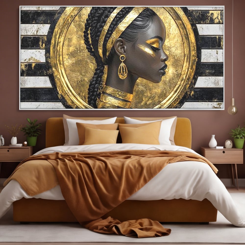 Tablou canvas cu tablou canvas cu portret afro, in rama de aluminiu argintiu, pe perete intr-un dormitor